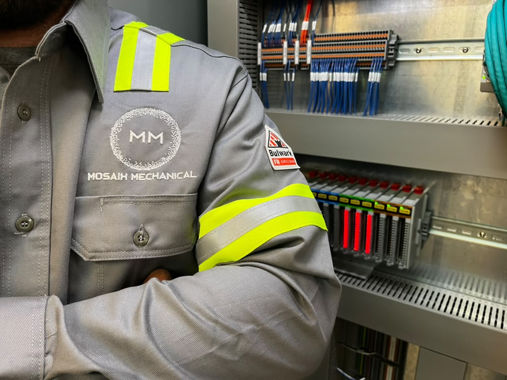 PLC processor and I/O modules wired inside a Mosaix Mechanical industrial control panel
